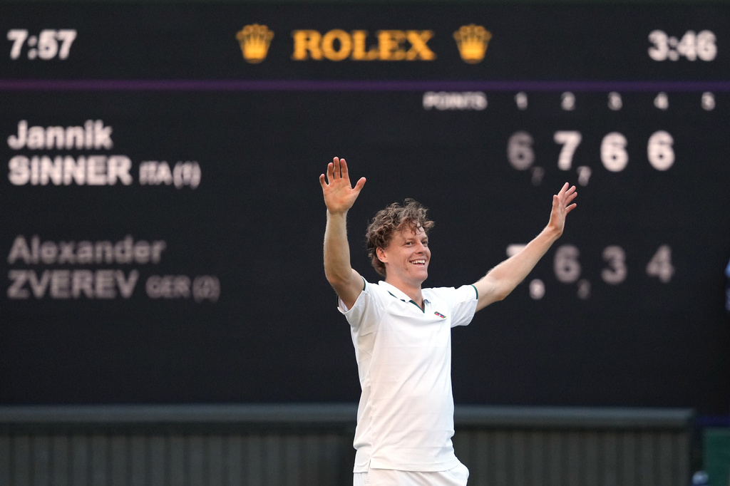 Jannik Sinner of Italy reacts to winning against Alexander Zverev of Germany in the men's singles final at Wimbledon Tennis Championships in London, Sunday, July 12, 2026. (AP Photo/Kirsty Wigglesworth)