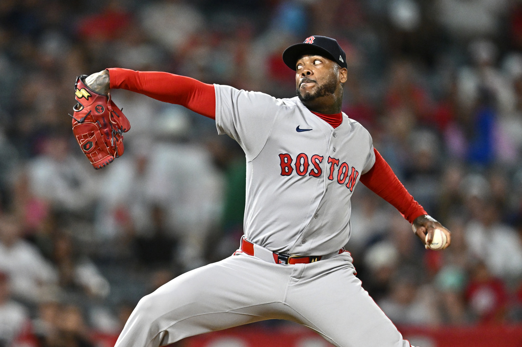 Boston Red Sox pitcher Aroldis Chapman delivers during the ninth inning of a baseball game against the Los Angeles Angels, Sunday, July 5, 2026, in Anaheim, Calif. (AP Photo/William Liang)