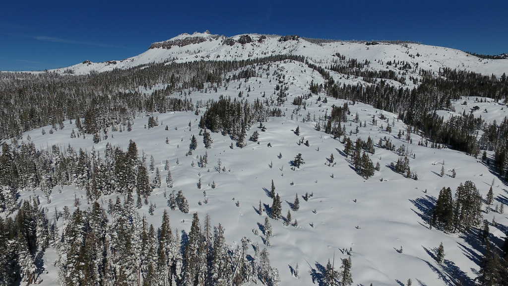 Castle Peak is shown in an aerial view on Friday, Feb. 20, 2026, near Soda Springs, Calif. (AP Photo/Godofredo A. Vásquez)