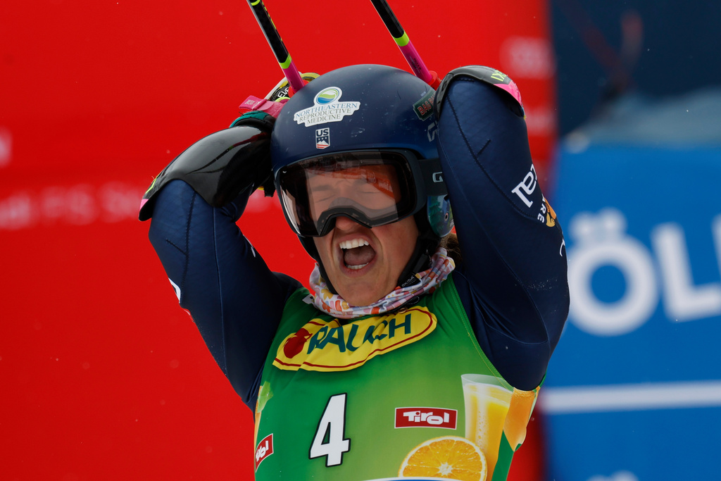 United States' Paula Moltzan celebrates at the finish area of an alpine ski, women's World Cup giant slalom, in Soelden, Austria, Saturday, Oct. 25, 2025. (AP Photo/Alessandro Trovati)