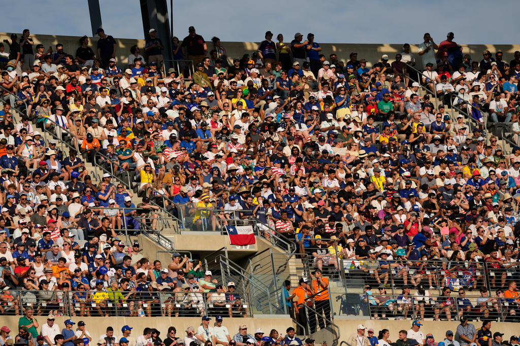 Supporters cheer during the World Cup round of 32 soccer match between France and Sweden in East Rutherford, N.J., near New York, Tuesday, June 30, 2026. (AP Photo/Seth Wenig)