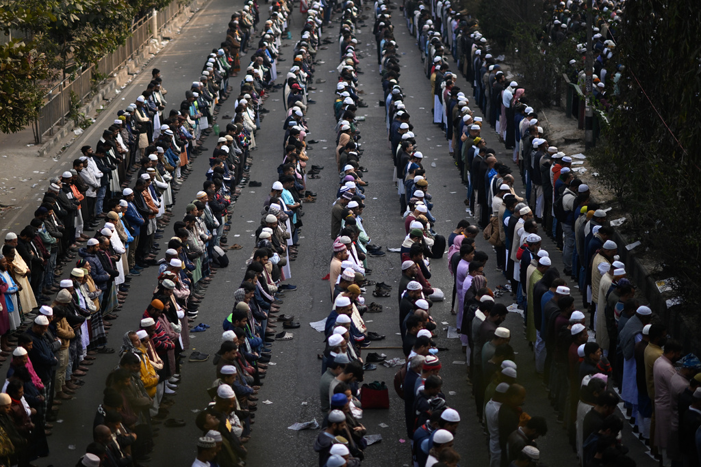 People attend funeral prayers for former Prime Minister Khaleda Zia outside the national Parliament building in Dhaka, Bangladesh, Wednesday, Dec. 31, 2025. (AP Photo/Mahmud Hossain Opu)