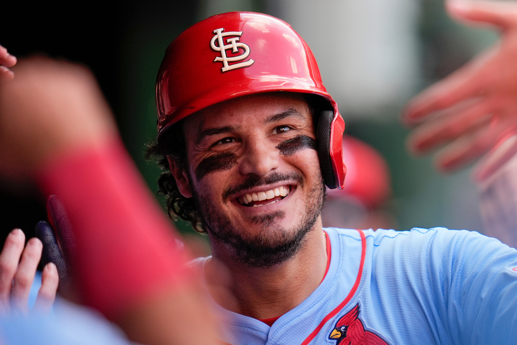 FILE - St. Louis Cardinals' Nolan Arenado celebrates in the dugout after hitting a home run during the fourth inning of a baseball game against the Chicago Cubs, Saturday, Sept. 27, 2025, in Chicago. (AP Photo/Erin Hooley, File)