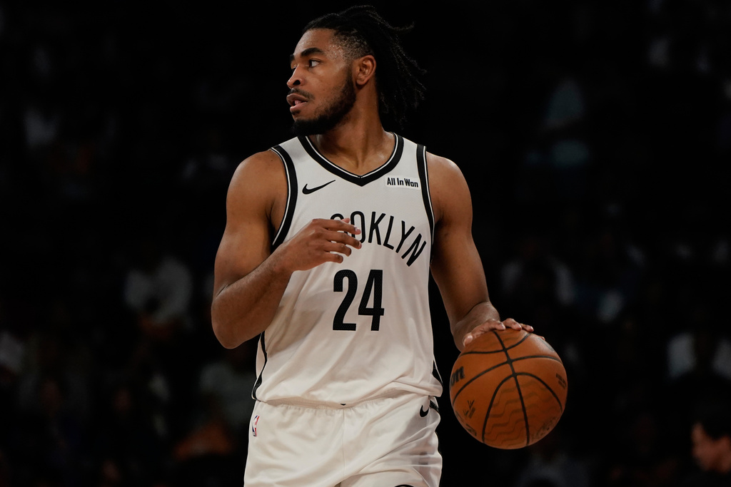 Brooklyn Nets guard Cam Thomas (24) drives during a preseason NBA basketball game between Phoenix Suns and Brooklyn Nets in Macao, Sunday, Oct. 12, 2025. (AP Photo/Vernon Yuen)