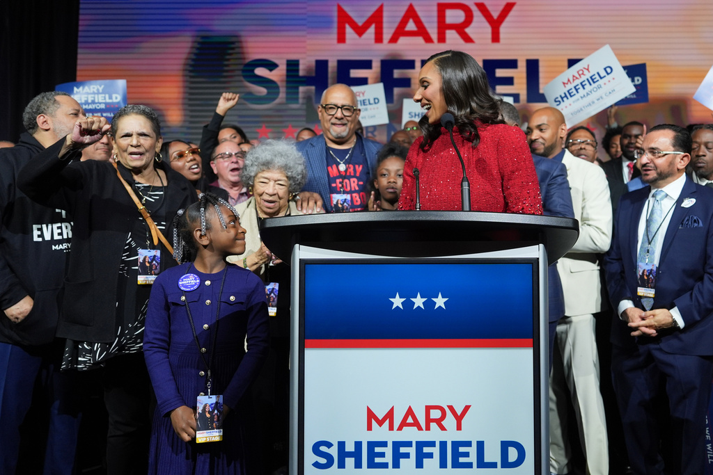 City Council President Mary Sheffield looks at her cousin, Rylan Owens, bottom left, as she speaks during an election night watch party after winning the mayoral race on Tuesday, Nov. 4, 2025, in Detroit. (AP Photo/Paul Sancya)
