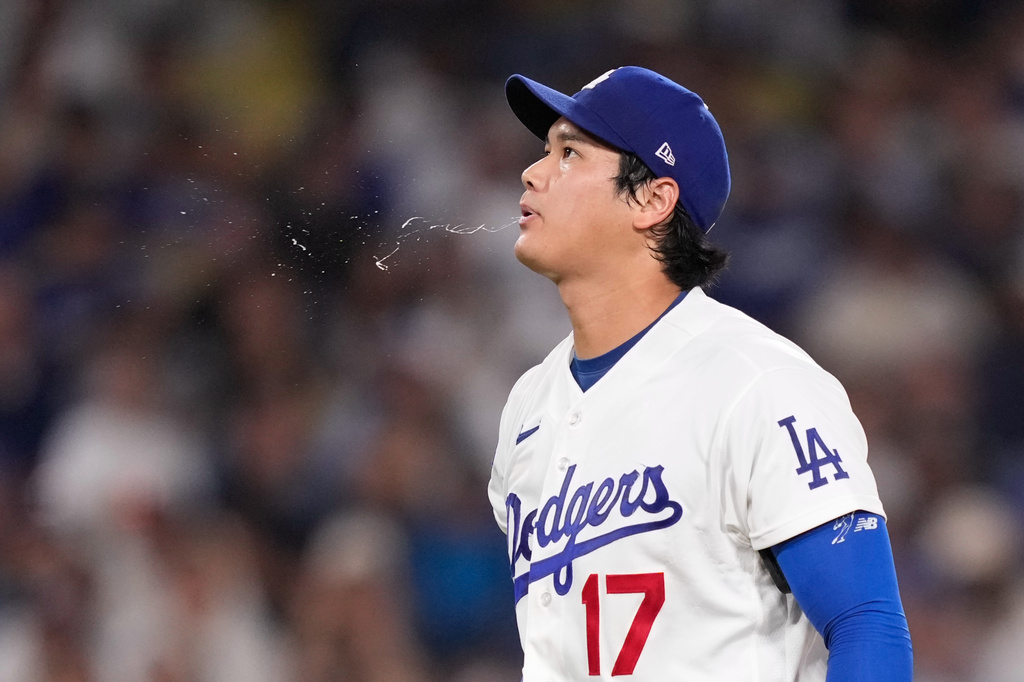 Los Angeles Dodgers starting pitcher Shohei Ohtani spits after San Diego Padres' Rodolfo Durán hit a foul ball during the sixth inning of a baseball game Friday, July 3, 2026, in Los Angeles. (AP Photo/Mark J. Terrill)
