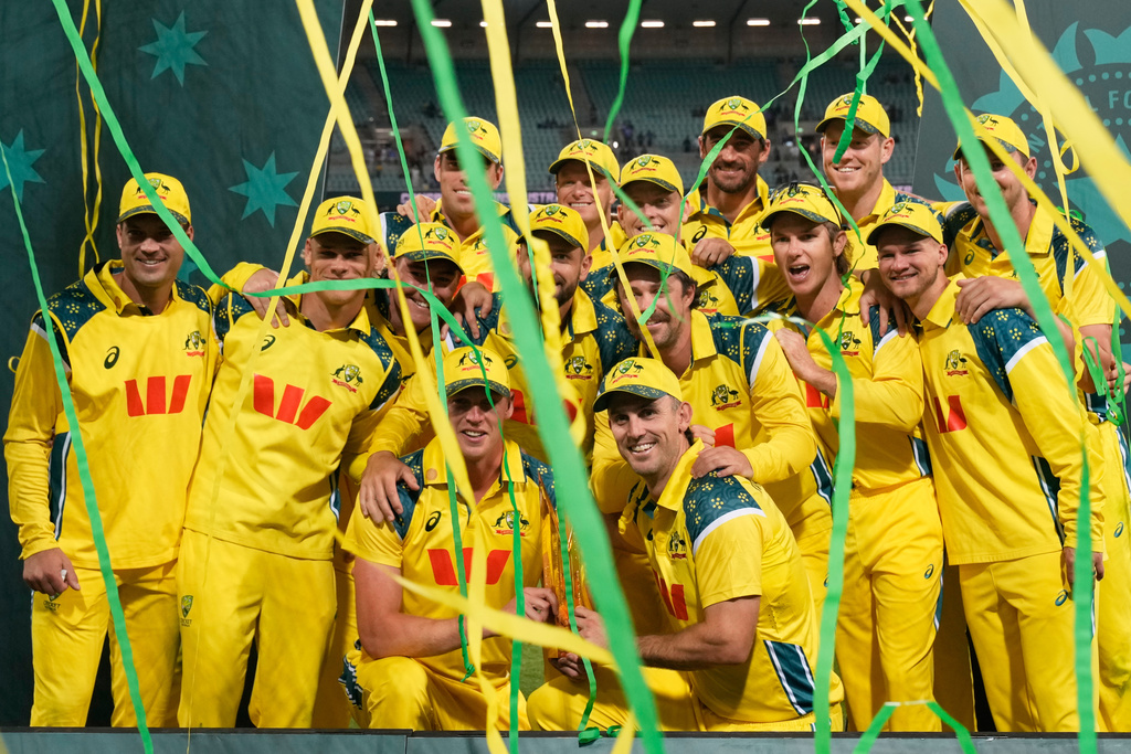 Australian players celebrate their series win over India after their One Day International cricket match in Sydney, Australia, Saturday, Oct. 25, 2025. (AP Photo/Rick Rycroft)
