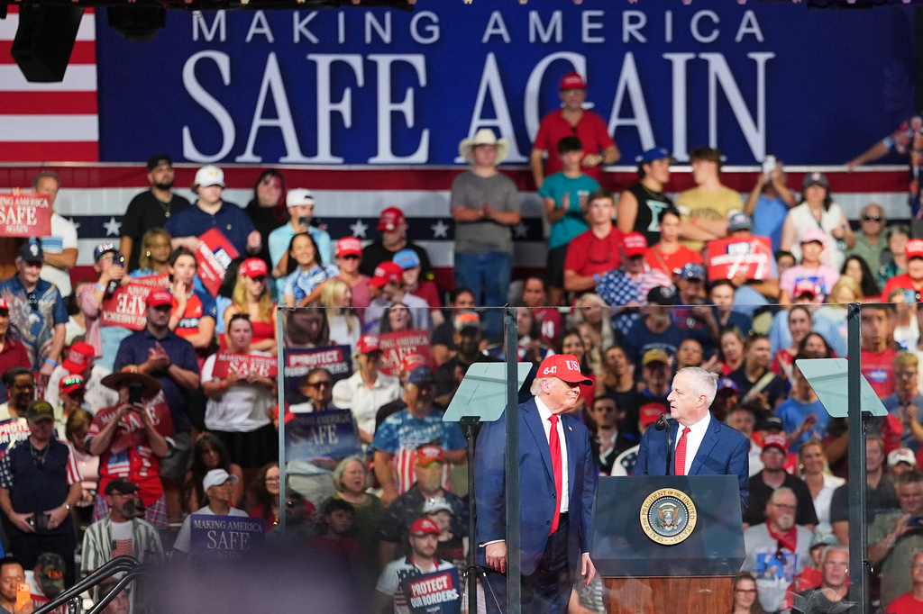 Michael Whatley, North Carolina senatorial candidate, right, and President Donald Trump speak during a campaign rally at the Gastonia Municipal Airport, Wednesday, Sept. 16, 2026, in Gastonia, N.C. (AP Photo/Matt Kelley)