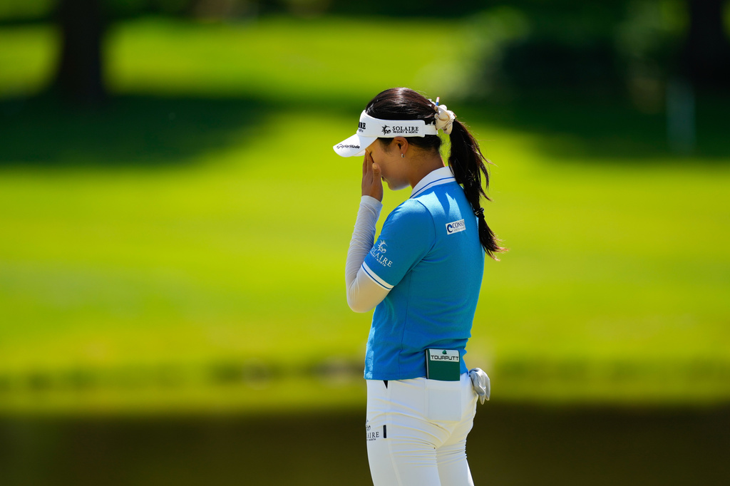 Ina Yoon, of South Korea, reacts after missing her shot on the sixth green during the third round of the Women's PGA Championship golf tournament at Hazeltine National Golf Club, Saturday, June 27, 2026, in Chaska,Minn. (AP Photo/Matt York)