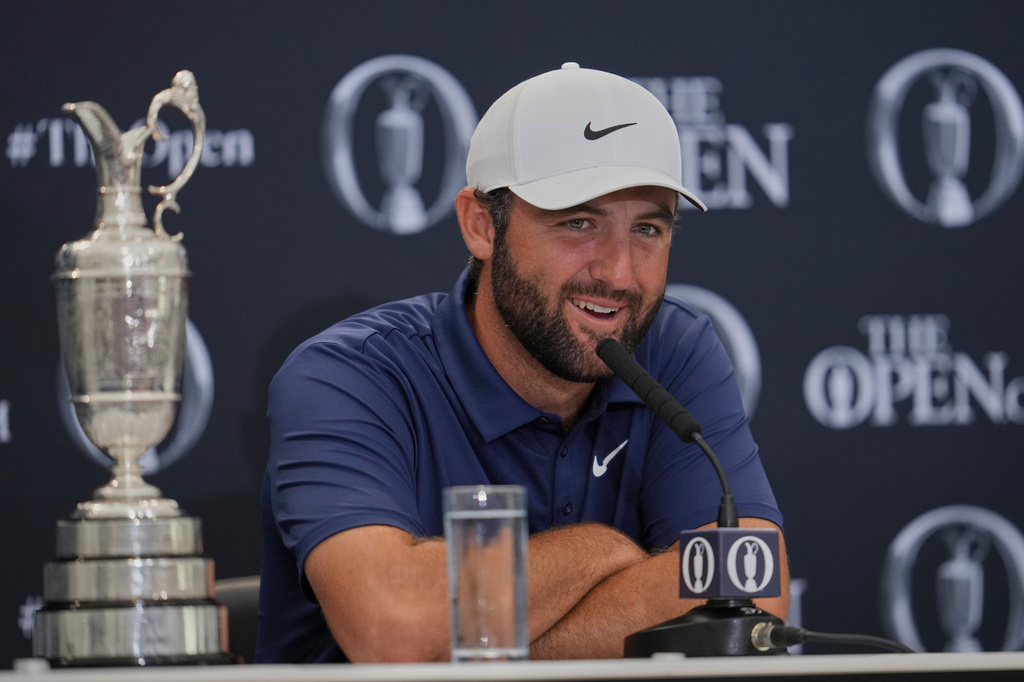 FILE - Scottie Scheffler of the United States speaks at a news conference after winning the British Open golf championship at the Royal Portrush Golf Club, Northern Ireland, July 20, 2025. (AP Photo/Jon Super, File)
