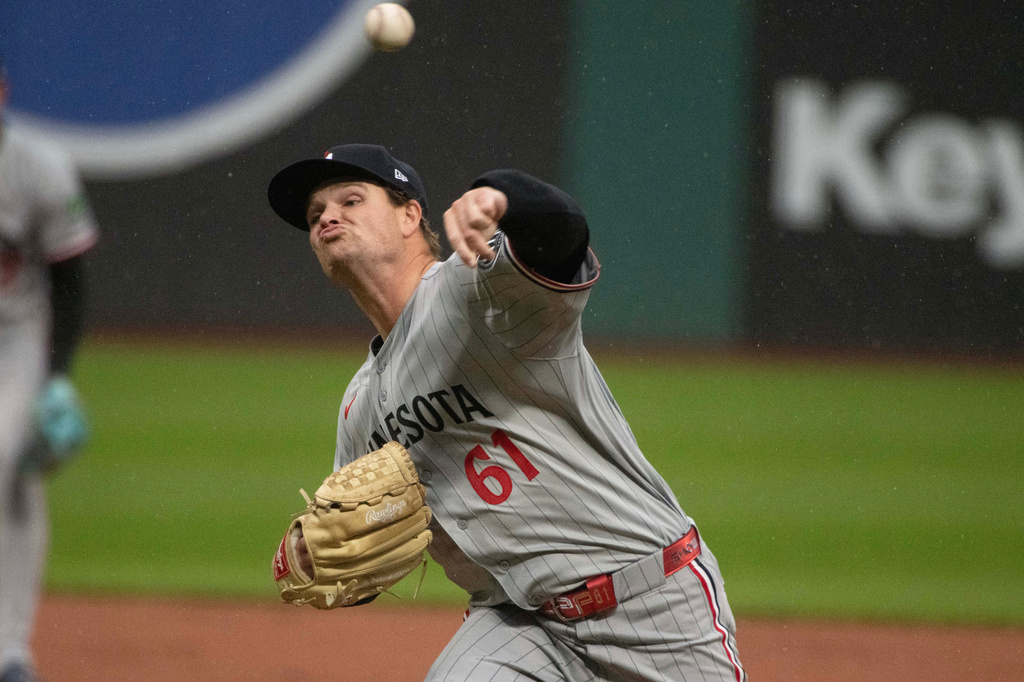 Minnesota Twins starting pitcher Connor Prelipp delivers against the Cleveland Guardians during the first inning of a baseball game, Friday, May 8, 2026, in Cleveland. (AP Photo/Phil Long)