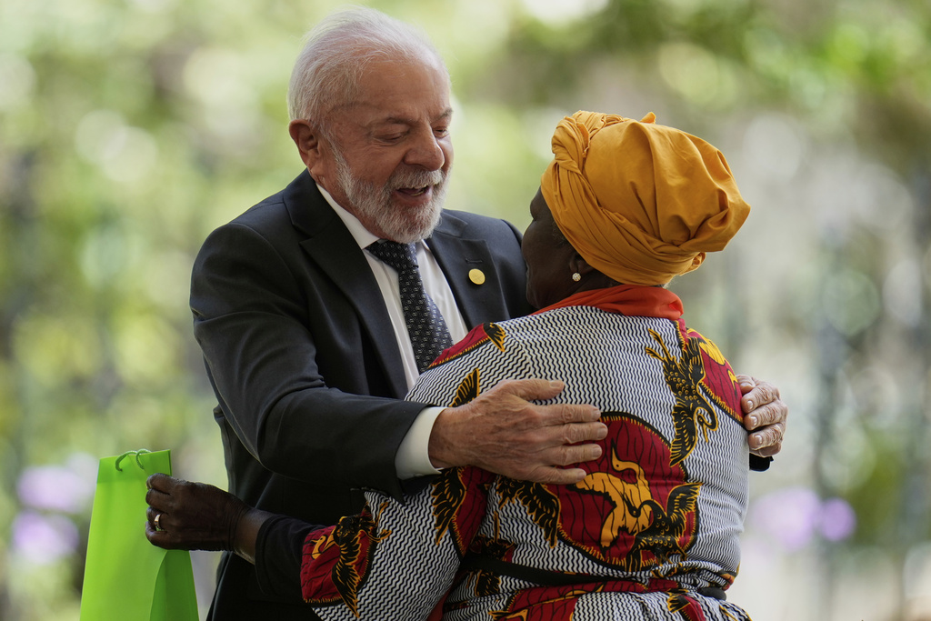 Brazil President Luiz Inacio Lula da Silva embraces Virgelina Chara, an Afro-Colombian leader and human rights activist, during a meeting of leaders of the Amazon Cooperation Treaty Organization in Bogota, Colombia, Friday, Aug. 22, 2025. (AP Photo/Fernando Vergara)