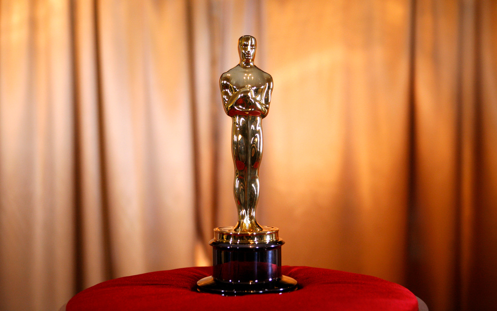 FILE - An Oscar statuette sits on display at an opening event for the "Meet The Oscars, New York" exhibit at the Time Warner Center in New York, Feb. 25, 2010. (AP Photo/Jason DeCrow, File)