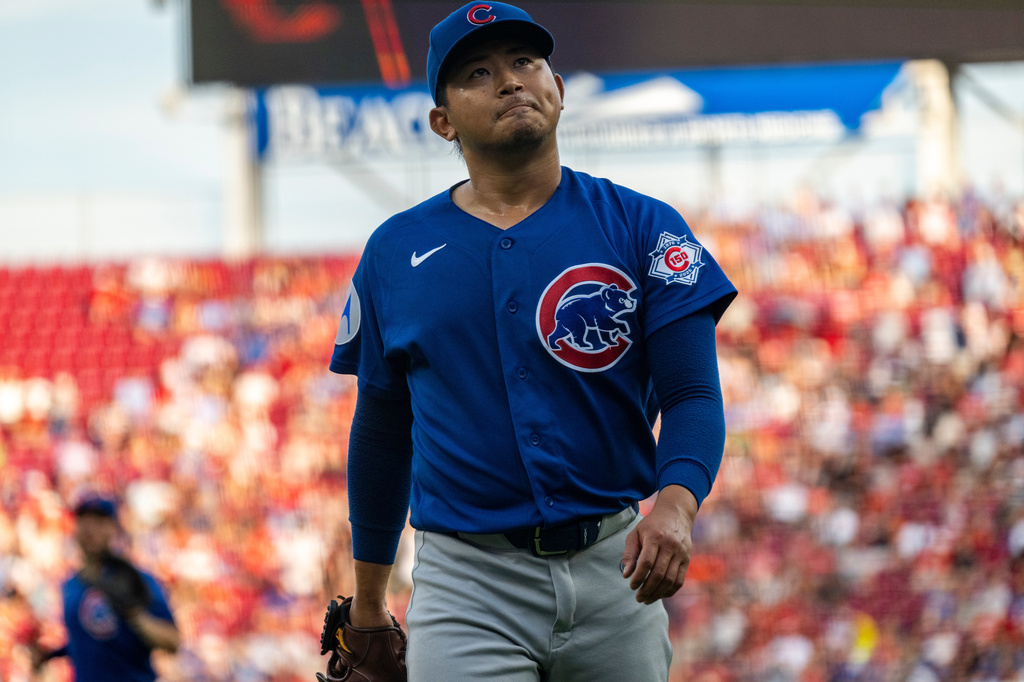 Chicago Cubs pitcher Shota Imanaga reacts after a strike out in the second inning of a baseball game against the Cincinnati Reds, Friday, July 10, 2026, in Cincinnati. (AP Photo/Michael Swensen)