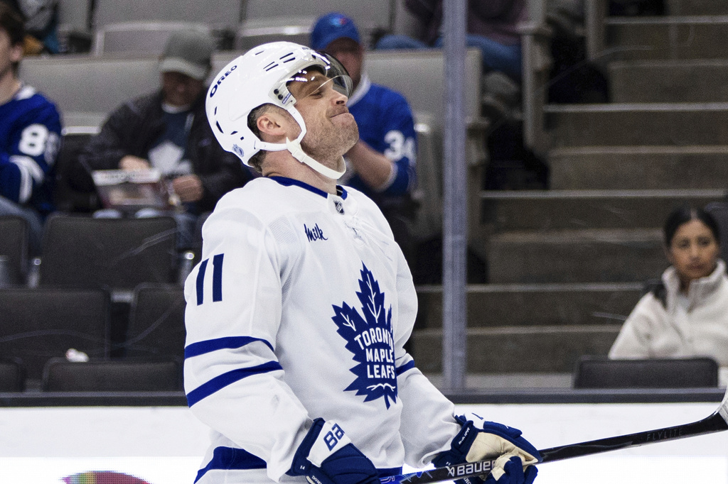 Toronto Maple Leafs center Max Domi (11) reacts after he misses a shot against the San Jose Sharks during the second period of an NHL hockey game in San Jose, Calif., Thursday, April 2, 2026. (AP Photo/John Hefti)