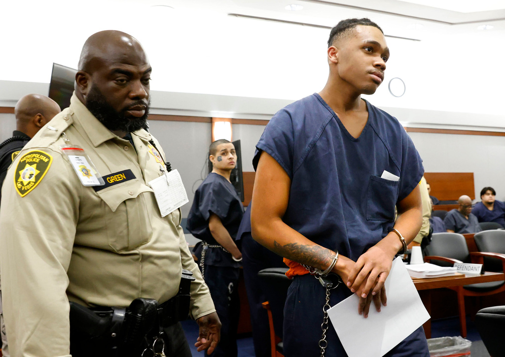 Jzamir Keys is escorted out of a courtroom as the second defendant Jesus Ayala, center, looks on after their sentencing for the killing of Andres Probst at the Regional Justice Center on Tuesday, Dec. 16, 2025, in Las Vegas. (Bizuayehu Tesfaye/Las Vegas Review-Journal via AP)
