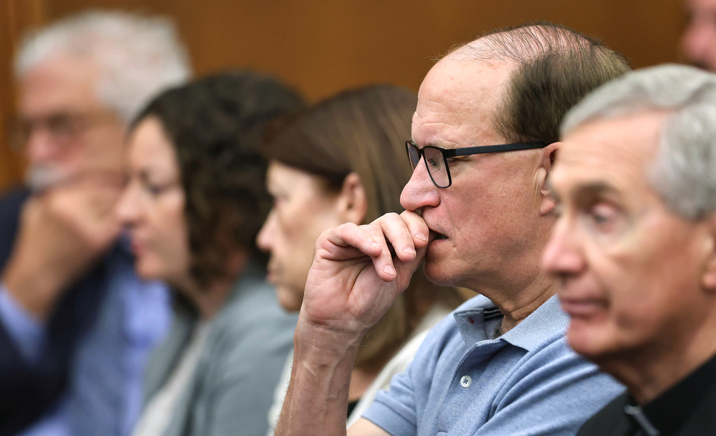 Mike Musgrove, father of Lindsay Clancy, center right, sits with family as they listen to the judge tell the jury to keep discussing a possible verdict after jurors said they couldn't agree for a second time whether Clancy is criminally responsible for killing her three children in 2023, Wednesday, Sept. 2, 2026, in Plymouth, Mass. (Greg Derr/The Patriot Ledger via AP, Pool)