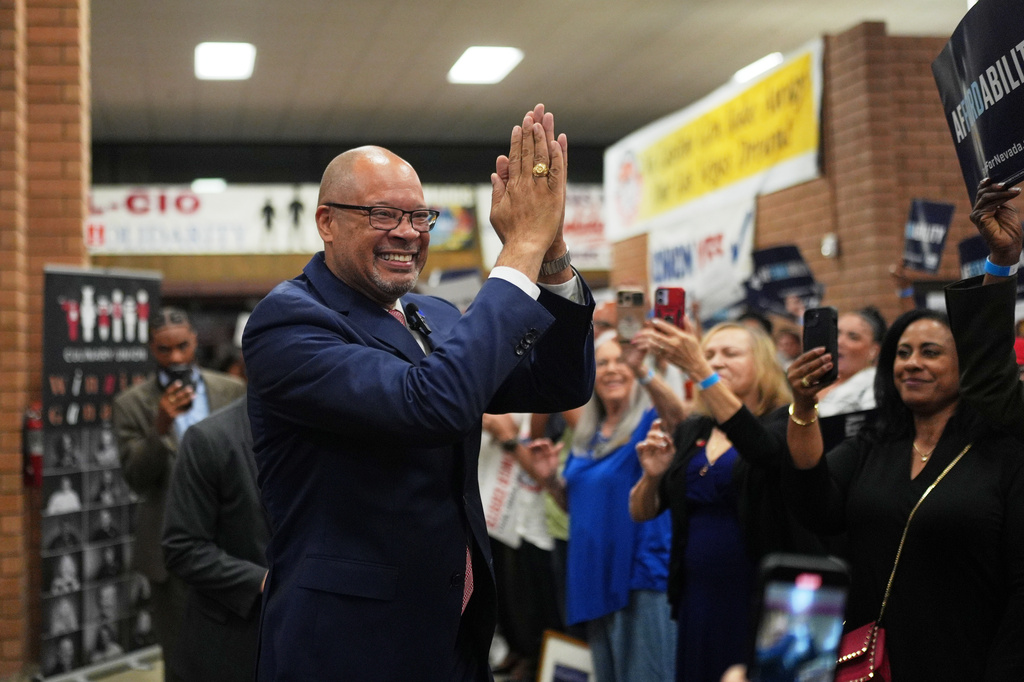 Gubernatorial candidate Aaron Ford, attorney general of Nevada, celebrates with attendees during a primary election night watch party after winning the Democratic nomination Tuesday, June 9, 2026, in Las Vegas. (AP Photo/Jae C. Hong)