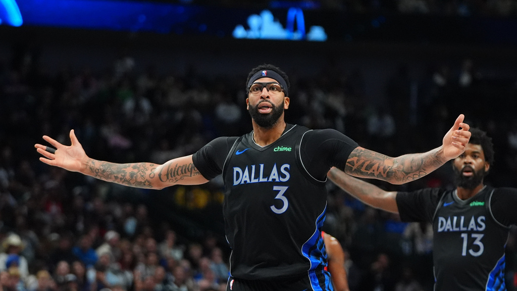Dallas Mavericks forward Anthony Davis (3) reacts to a call during the second half of an NBA basketball game against the Houston Rockets in Dallas, Saturday, Dec. 6, 2025. (AP Photo/LM Otero)