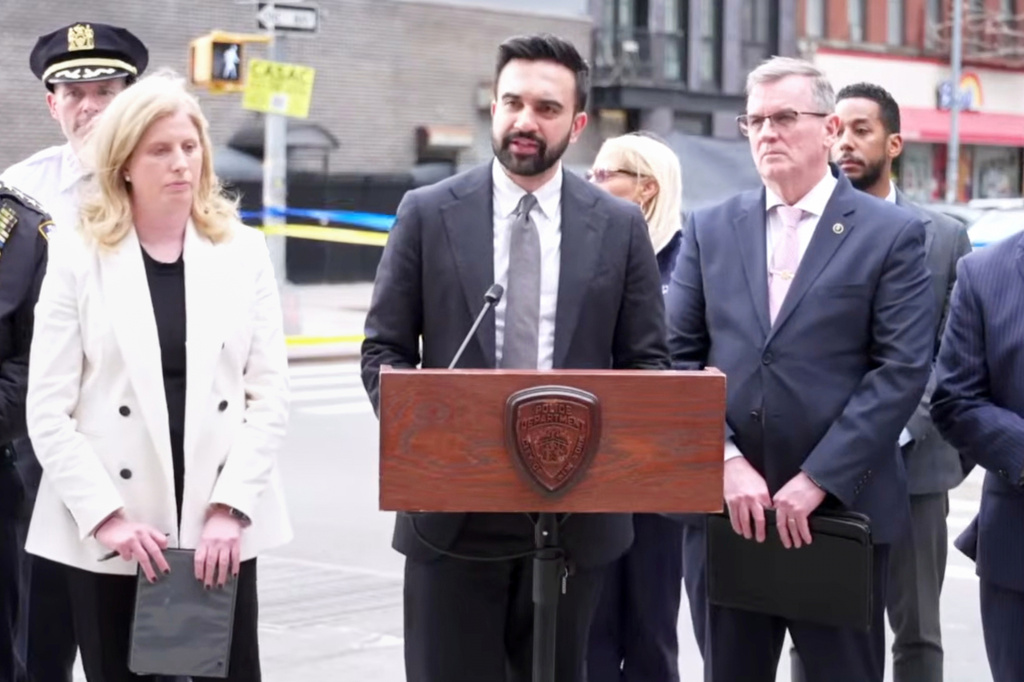 This image taken from video provided by the New York Police Department shows New York Mayor Zohran Mamdani, flanked by Police Commissioner Jessica Tisch, left, and Chief of Detectives Joseph Kenny, speaking during a news conference, Wednesday, April 1, 2026, in New York. (NYPD via AP)