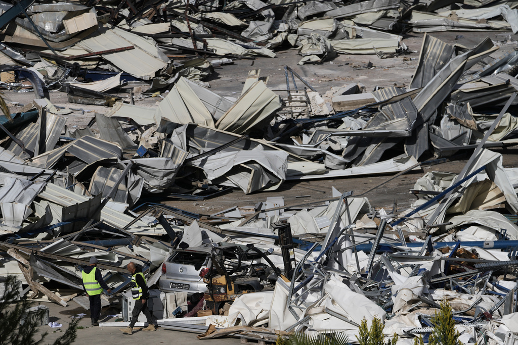 Israeli authorities demolish a UNRWA compound, belonging to the U.N. agency that assists Palestinian refugees, in east Jerusalem Tuesday, Jan. 20, 2026. (AP Photo/Mahmoud Illean)