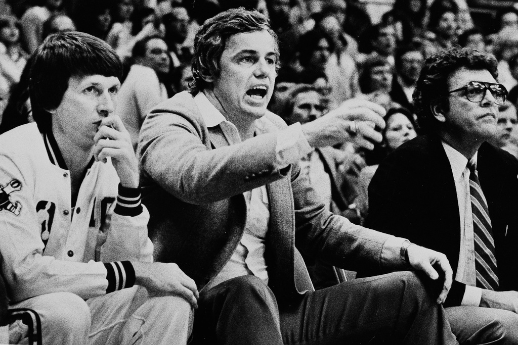 FILE - Denver Nuggets head coach Doug Moe, center, directs his team from the bench during an NBA basketball game against the Phoenix Suns on April 21, 1982, in Denver. (AP Photo/JC, File)