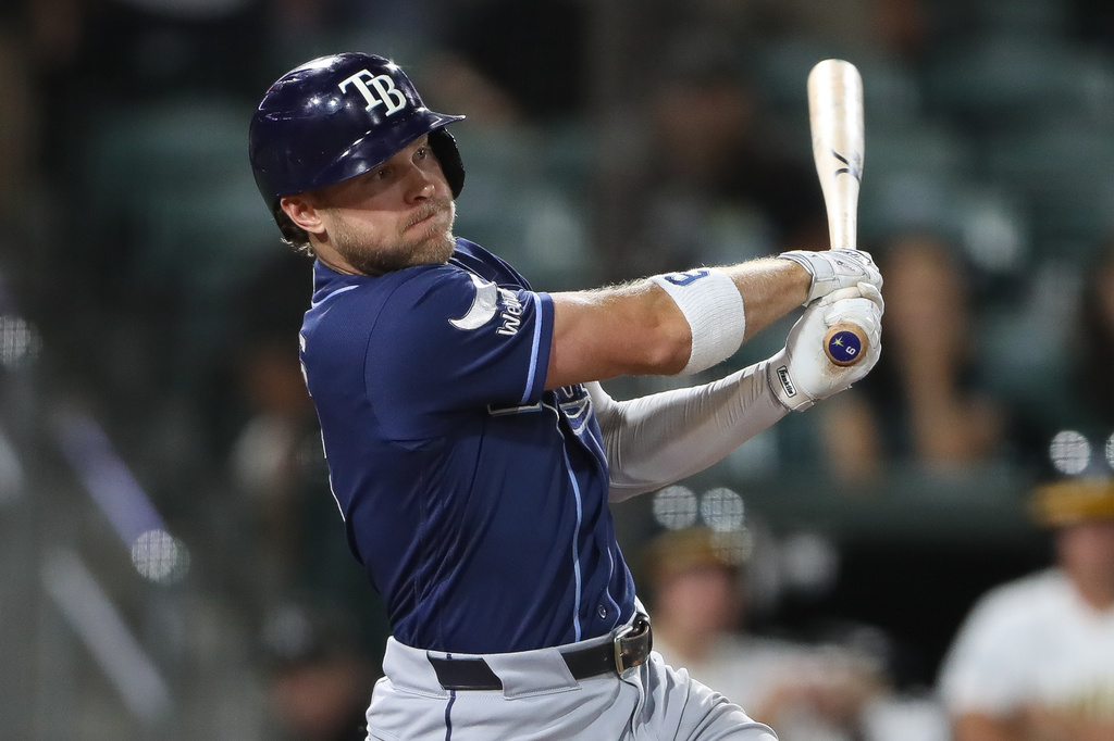 Tampa Bay Rays' Taylor Walls hits a two RBI single during the eighth inning of a baseball game against the Athletics Monday, Aug. 10, 2026, in West Sacramento, Calif. (AP Photo/Scott Marshall)
