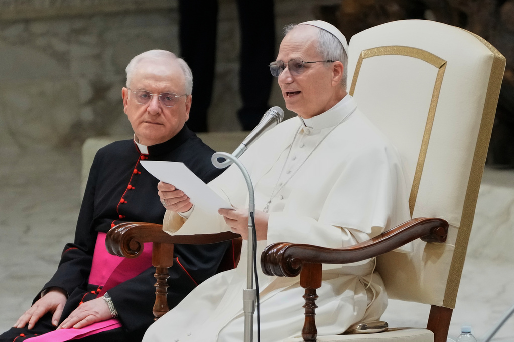 Pope Leo XIV reads his message during a weekly general audience at the Vatican, Wednesday, Feb. 11, 2026. (AP Photo/Gregorio Borgia)