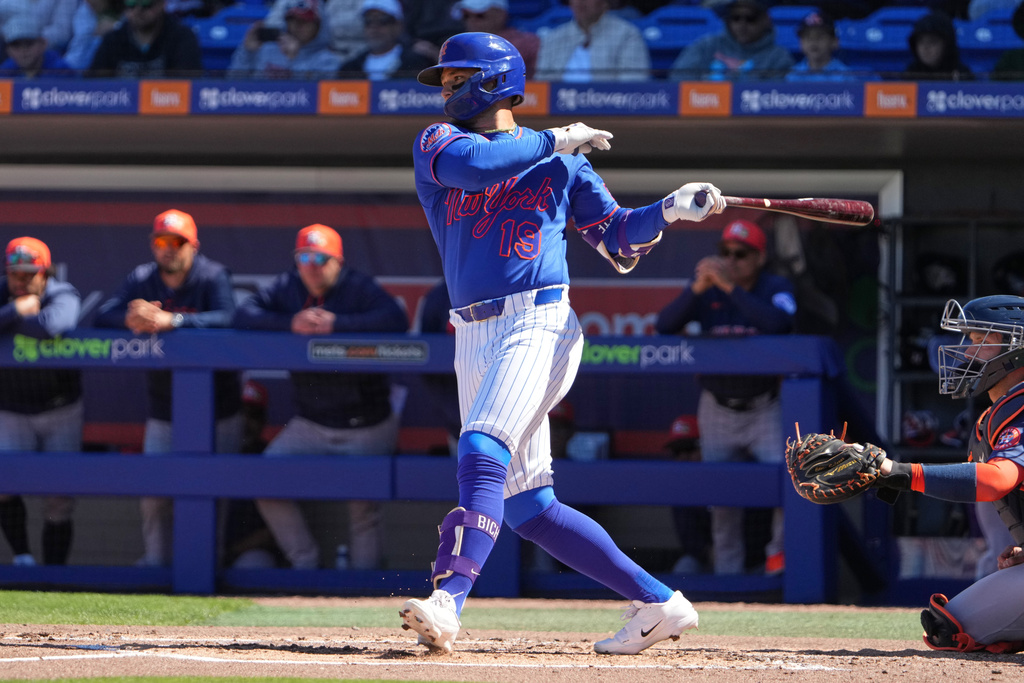 FILE - New York Mets' Bo Bichette singles during the first inning of a spring training baseball game against the Houston Astros Tuesday, Feb. 24, 2026, in Port St. Lucie, Fla. (AP Photo/Jeff Roberson, File)