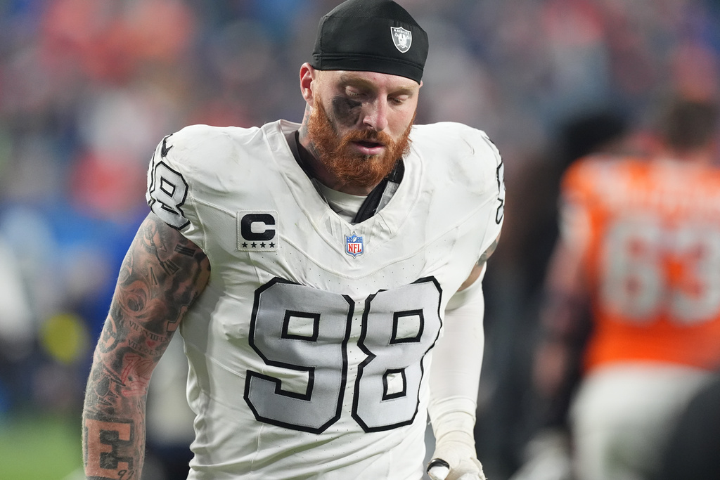 Las Vegas Raiders defensive end Maxx Crosby heads off the field after an NFL football game against the Denver Broncos, Thursday, Nov. 6, 2025, in Denver. (AP Photo/David Zalubowski)