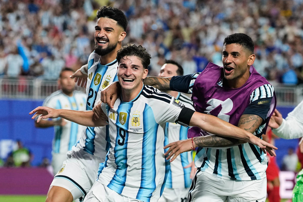 Argentina's Julian Alvarez (9) celebrates after scoring his side's second goal during the World Cup quarterfinal soccer match against Switzerland in Kansas City, Mo., Saturday, July 11, 2026. (AP Photo/Charlie Riedel)
