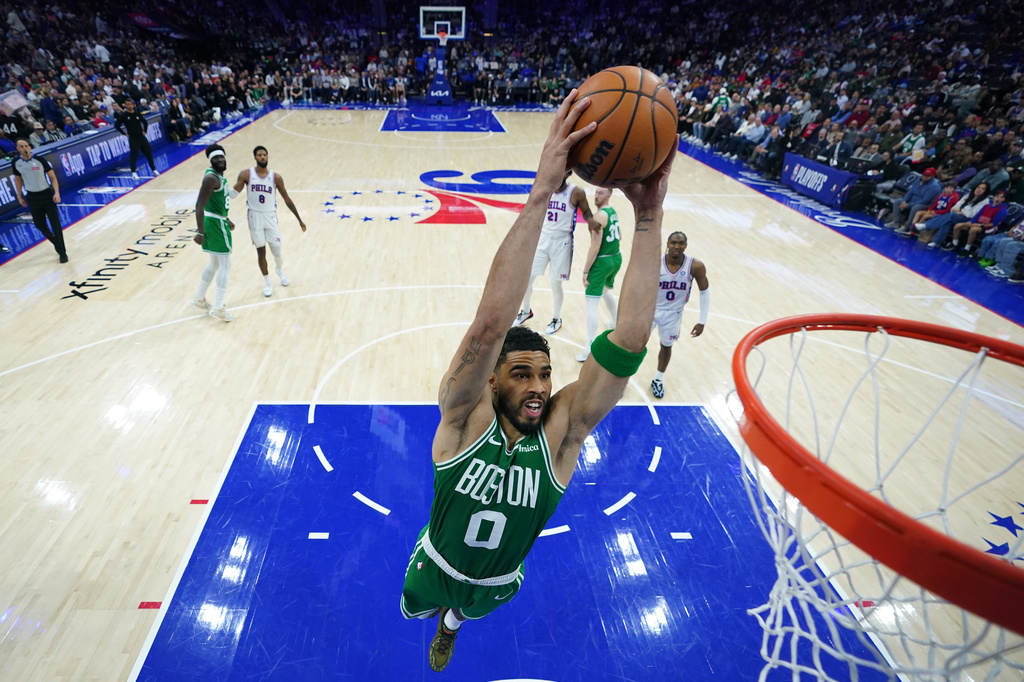 Boston Celtics' Jayson Tatum goes up for a dunk during the second half of Game 6 in a first-round NBA basketball playoff series against the Philadelphia 76ers Thursday, April 30, 2026, in Philadelphia. (AP Photo/Matt Slocum)