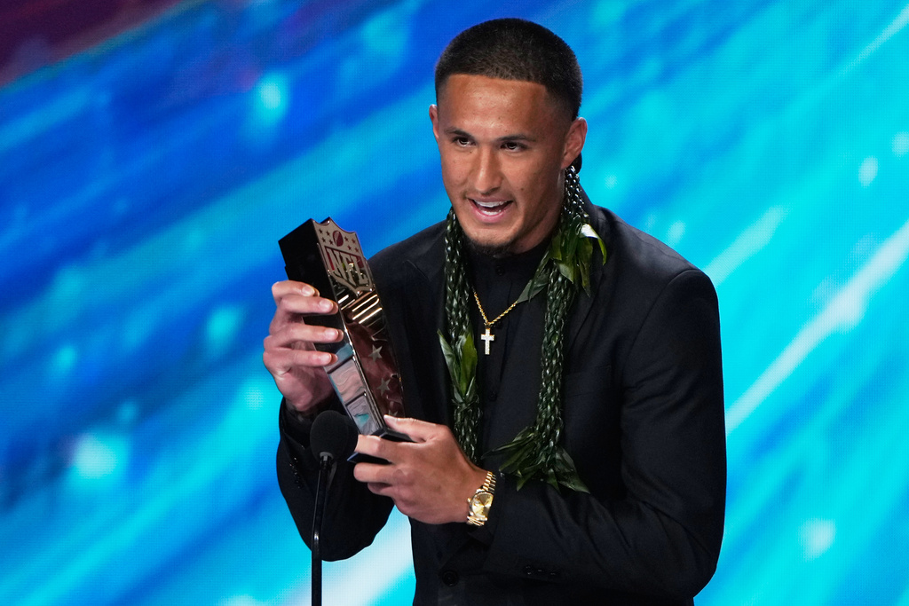 Carolina Panthers' Tetairoa McMillan accepts the AP Offensive Rookie of the Year award during the NFL Honors award show, Thursday, Feb. 5, 2026, in San Francisco. (AP Photo/Charlie Riedel)