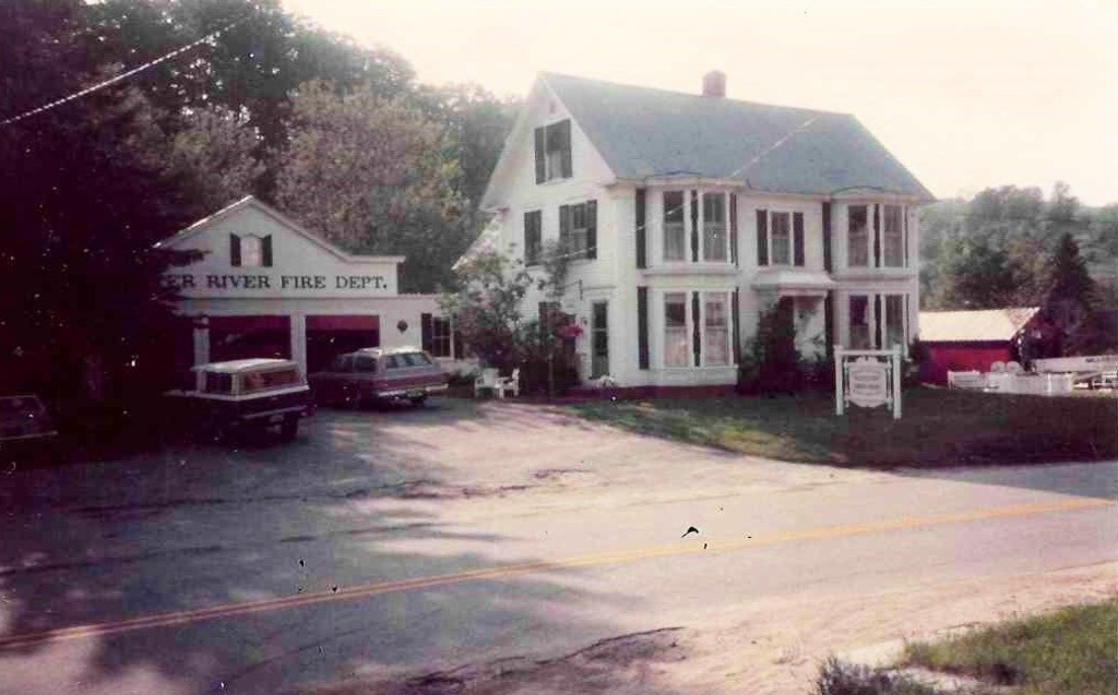 In this photo provided by East Corinth resident Sarah Polli, Polli's family home is shown after it was converted into the Winter River Fire Department for the "Beetlejuice" film in June, 1987 in East Corinth, Vt. (Courtesy Sarah Polli)
