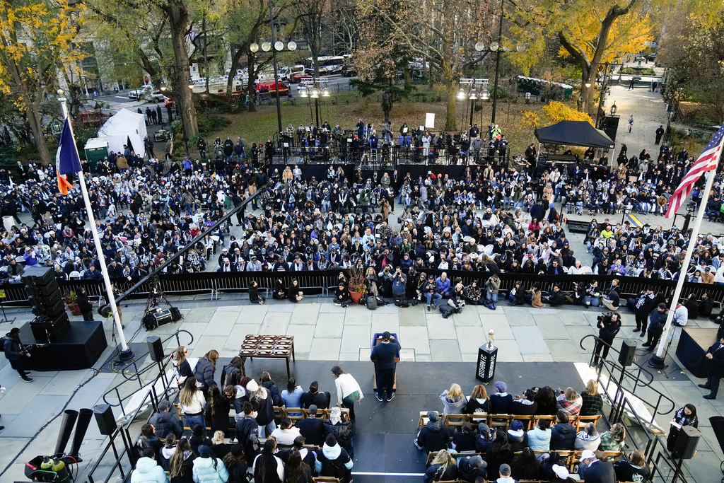 Mayor Eric Adams addresses a crowd in front of City Hall during a ceremony celebrating the Gotham Football Club's win over the Washington Spirit for the NWSL championship, Monday, Nov. 24, 2025, in New York. (Michael Appleton/New York City Mayor's Office via AP)