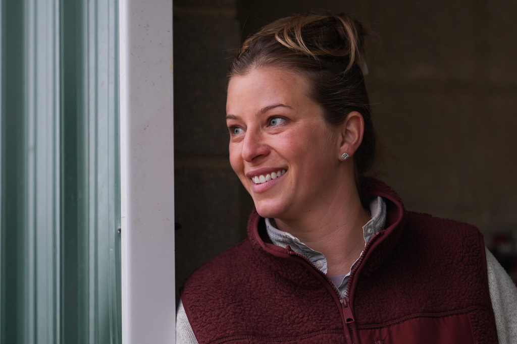 Trainer Brittany Russell talks to people in her barn ahead of the 102nd running of the Black-Eyed Susan horse race, Friday, May 15, 2026, at Laurel Park in Laurel, Md. (AP Photo/Julia Demaree Nikhinson)