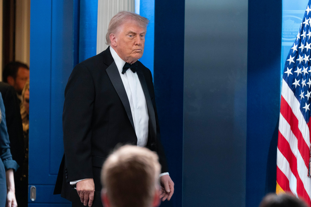 President Donald Trump arrives to speak to the media in the James Brady Press Briefing Room at the White House after an unspecified threat at the annual White House Correspondents' Association Dinner in Washington, Saturday, April 25, 2026, as Vice President JD Vance watches. (AP Photo/Jose Luis Magana)