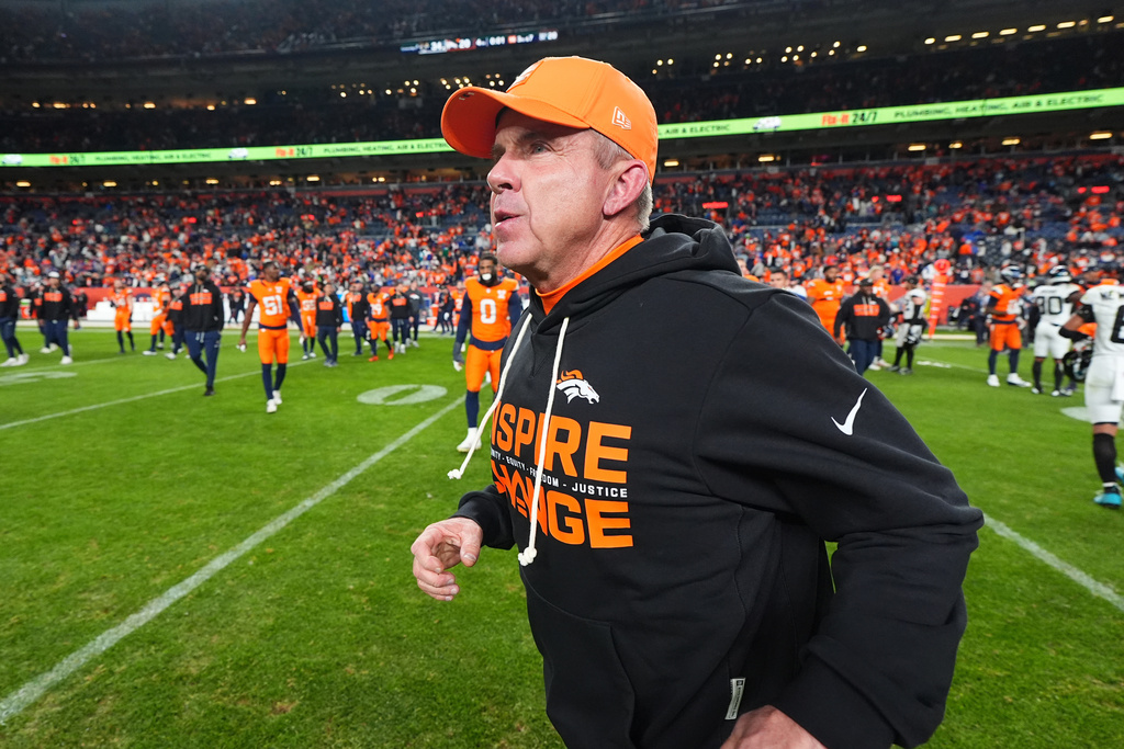 Denver Broncos head coach Sean Payton runs on the field after an NFL football game against the Jacksonville Jaguars in Denver, Sunday, Dec. 21, 2025. (AP Photo/Jack Dempsey)