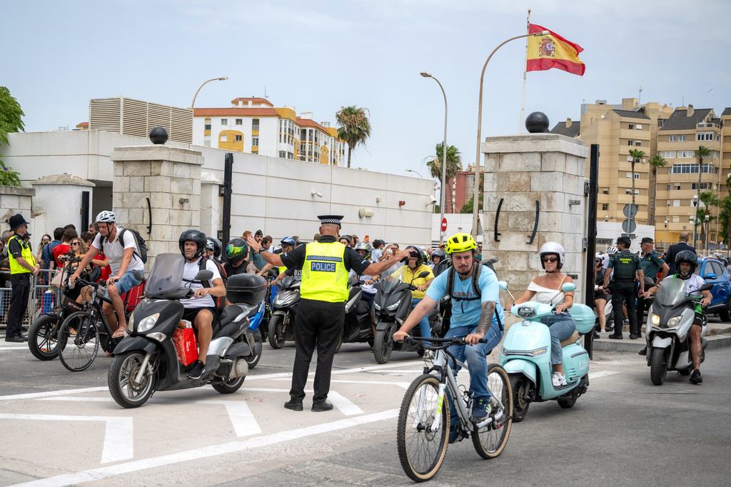 Motorists cross the Gibraltar-Spain border on the first day of passport-free travel under a new EU-U.K. treaty in La Línea de la Concepción, Spain, Wednesday, July 15, 2026. (AP Photo/Marcos Moreno)