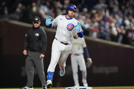 Chicago Cubs' Ian Happ (8) runs the bases after hitting a 3-run home run during the first inning of Game 4 of baseball's National League Division Series against the Milwaukee Brewers Thursday, Oct. 9, 2025, in Chicago. (AP Photo/Nam Y. Huh) Chicago Cubs' Ian Happ (8) runs the bases after hitting a 3-run home run during the first inning of Game 4 of baseball's National League Division Series against the Milwaukee Brewers Thursday, Oct. 9, 2025, in Chicago. (AP Photo/Nam Y. Huh)