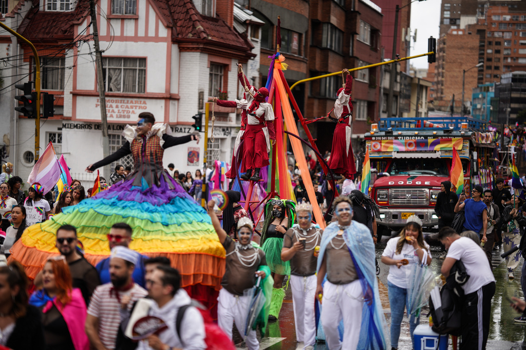 People march during the annual Pride parade in Bogota, Colombia, Sunday, June 28, 2026. (AP Photo/Ivan Valencia)