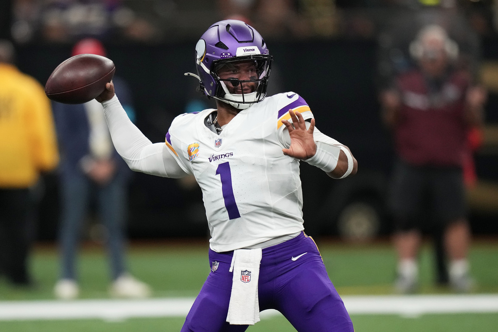Minnesota Vikings quarterback Kyler Murray (1) passes against the New Orleans Saints during the first half of an NFL football game in New Orleans, Sunday, Oct. 11, 2026. (AP Photo/Matthew Hinton)