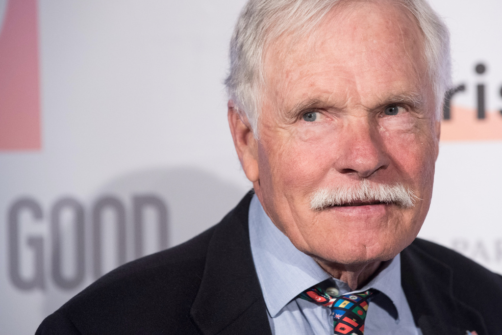FILE - U.S. media mogul Ted Turner poses for the photographers as he arrives prior to a dinner at the US Ambassador's residence in Paris, Dec. 8, 2015. (AP Photo/Kamil Zihnioglu, File)