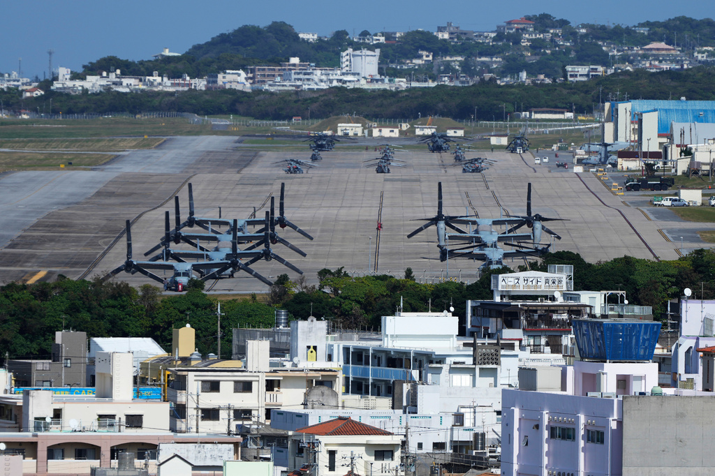 FILE - U.S. MV-22 Osprey transport aircraft are parked at the U.S. Marine Corps Air Station Futenma in Ginowan, on the main island of the Okinawa archipelago, southern Japan, Tuesday, Feb. 18, 2025. (AP Photo/Hiro Komae, File)