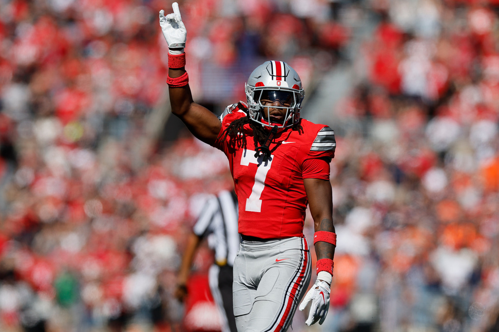 Ohio State wide defensive back Jermaine Mathews celebrates Ohio State taking over on downs against Illinois during the second half of an NCAA college football game, Saturday, Sept. 26, 2026, in Columbus, Ohio. (AP Photo/Jay LaPrete)