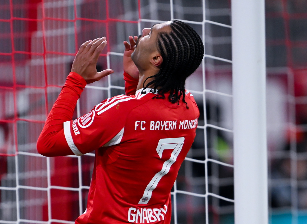 Munich's Serge Gnabry reacts during the German Bundesliga soccer match between FC Bayern Munich and FSV Mainz 05 in Munich, Germany, Sunday, Dec. 14, 2025. (Sven Hoppe/dpa via AP)