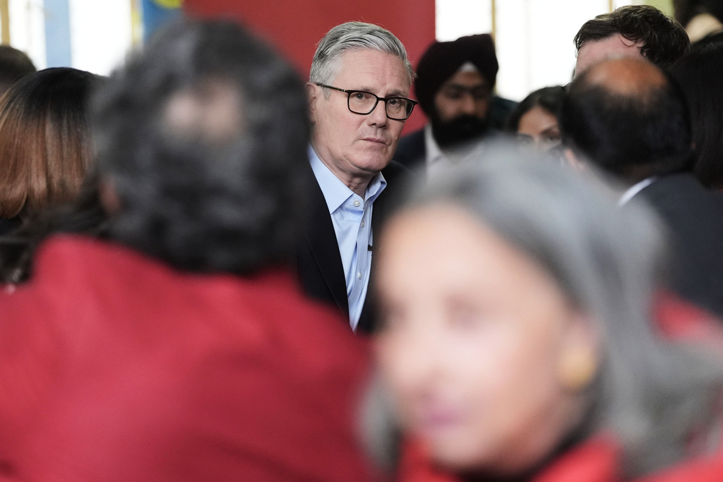 Britain's Prime Minister Sir Keir Starmer meets Labour Party members at Kingsdown Methodist Church Hall, in Ealing, west London, Friday May 8, 2026, a day after the local elections. (Stefan Rousseau/PA via AP)