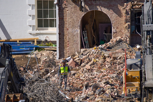 A worker walks through debris at a largely demolished part of the East Wing of the White House, Thursday, Oct. 23, 2025, in Washington, before construction of a new ballroom. (AP Photo/Jacquelyn Martin) A worker walks through debris at a largely demolished part of the East Wing of the White House, Thursday, Oct. 23, 2025, in Washington, before construction of a new ballroom. (AP Photo/Jacquelyn Martin)