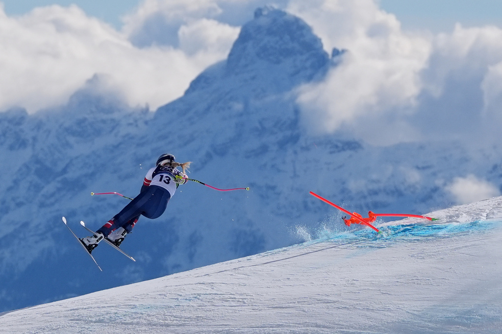 FILE - United States' Lindsey Vonn crashes during an alpine ski women's downhill race, at the 2026 Winter Olympics, in Cortina d'Ampezzo, Italy, Sunday, Feb. 8, 2026. (AP Photo/Jacquelyn Martin, file)
