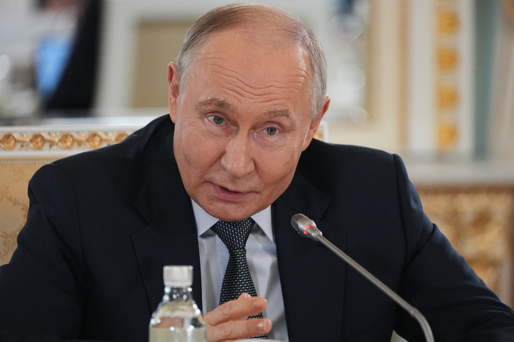 Russian President Vladimir Putin speaks to representatives of international news agencies on the sidelines of the St. Petersburg International Economic Forum at the Constantine Palace in St. Petersburg, Russia, on Thursday, June 4, 2026. (AP Photo/Dmitri Lovetsky, Pool)